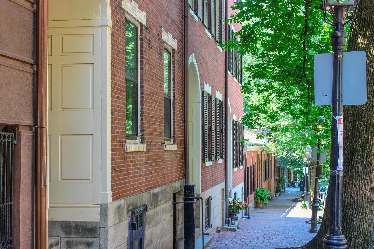 A narrow street of brick houses in Boston