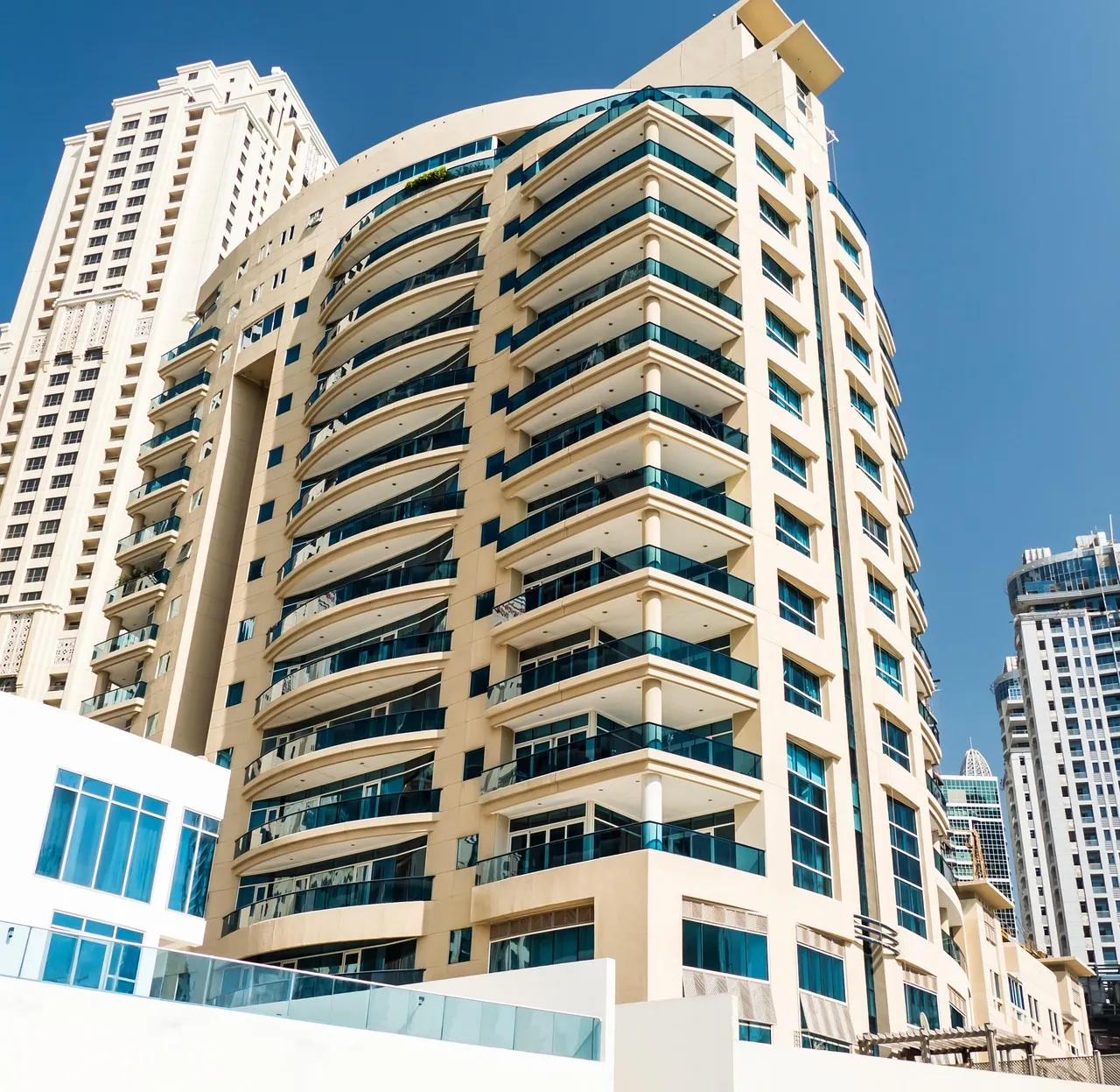 An apartment tower with curved balconies in Dubai
