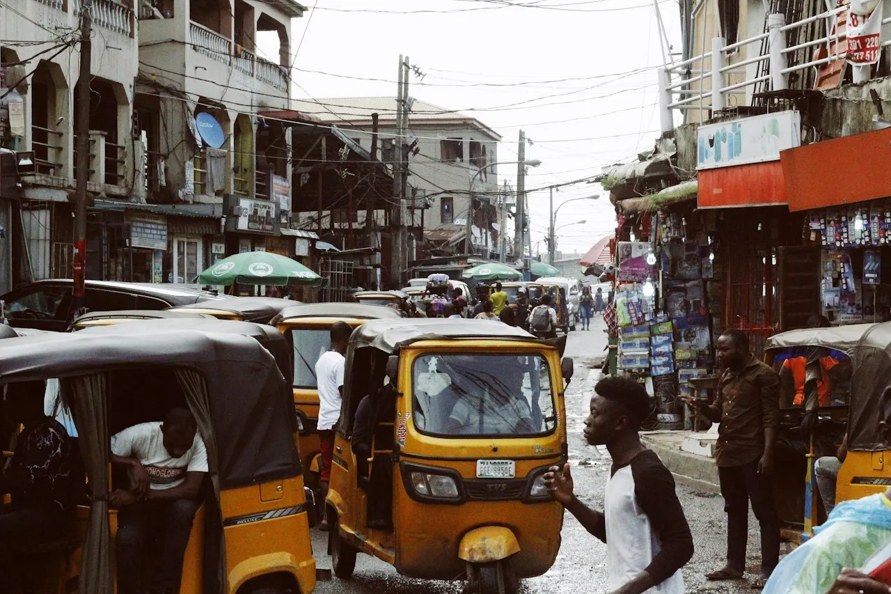 Tricycle taxis on a busy street in Lagos