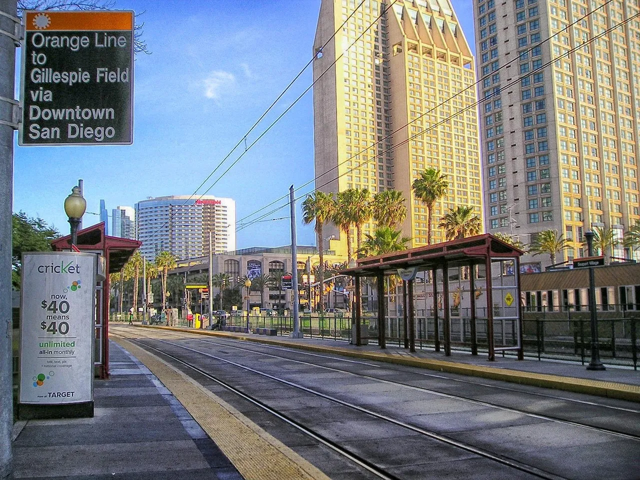 A trolley stop among downtown towers
