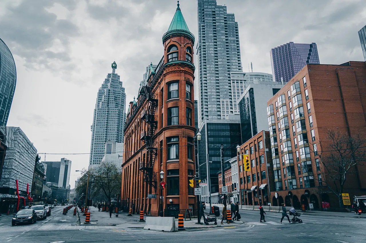 The Gooderham flatiron building among Toronto’s towers