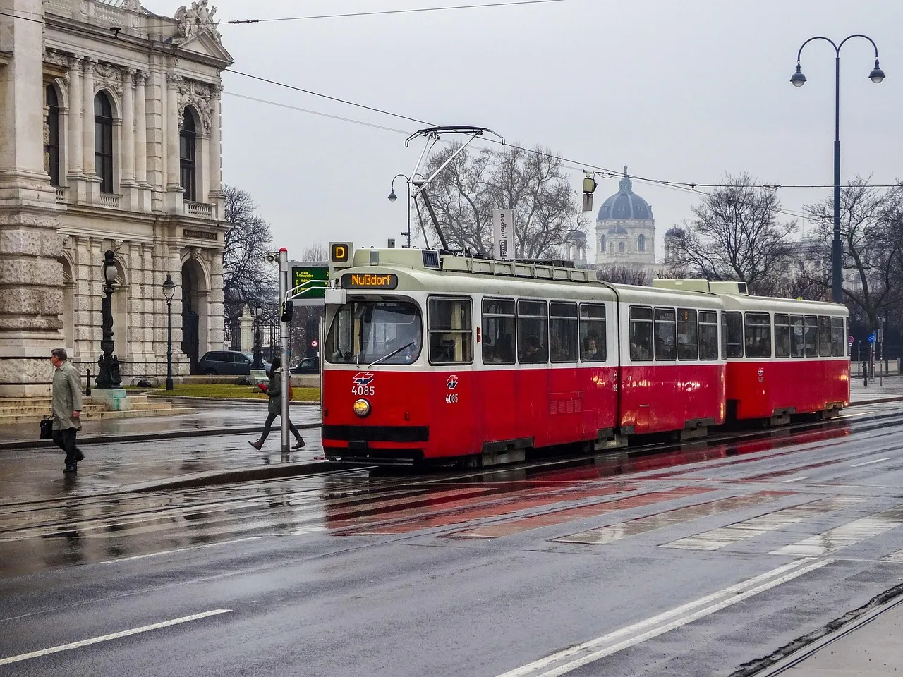 A tram on a wet Vienna street
